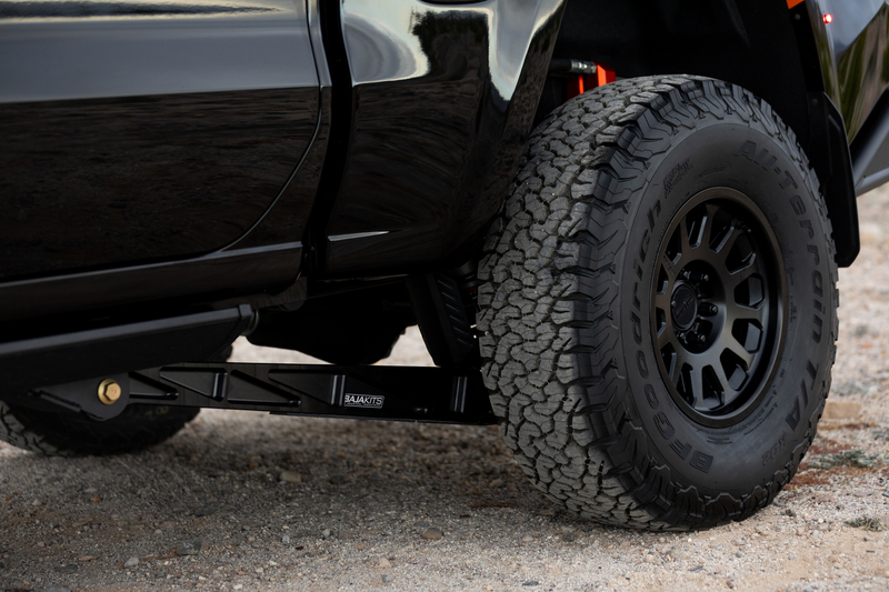 Baja Kits trailing arm system with FOX 3.2 Coil-over system in rear of Chevy Silverado