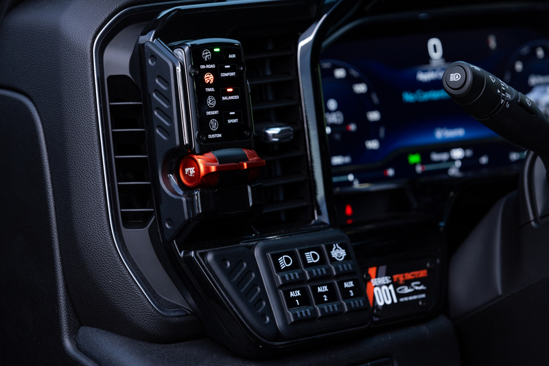 FOX Factory live valve shock management system show 8-position controller inside Chevy Silverado cab